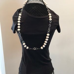 Long silver and white necklace